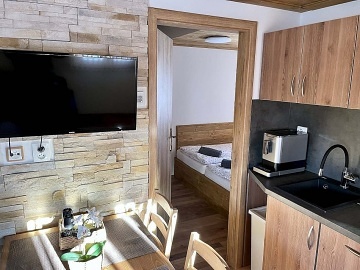 Chaty a apartm�ny - wellness a baz�n - p�ehrada Lipno