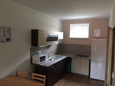Chaty a apartmány s bazénem - kemp Karolína
